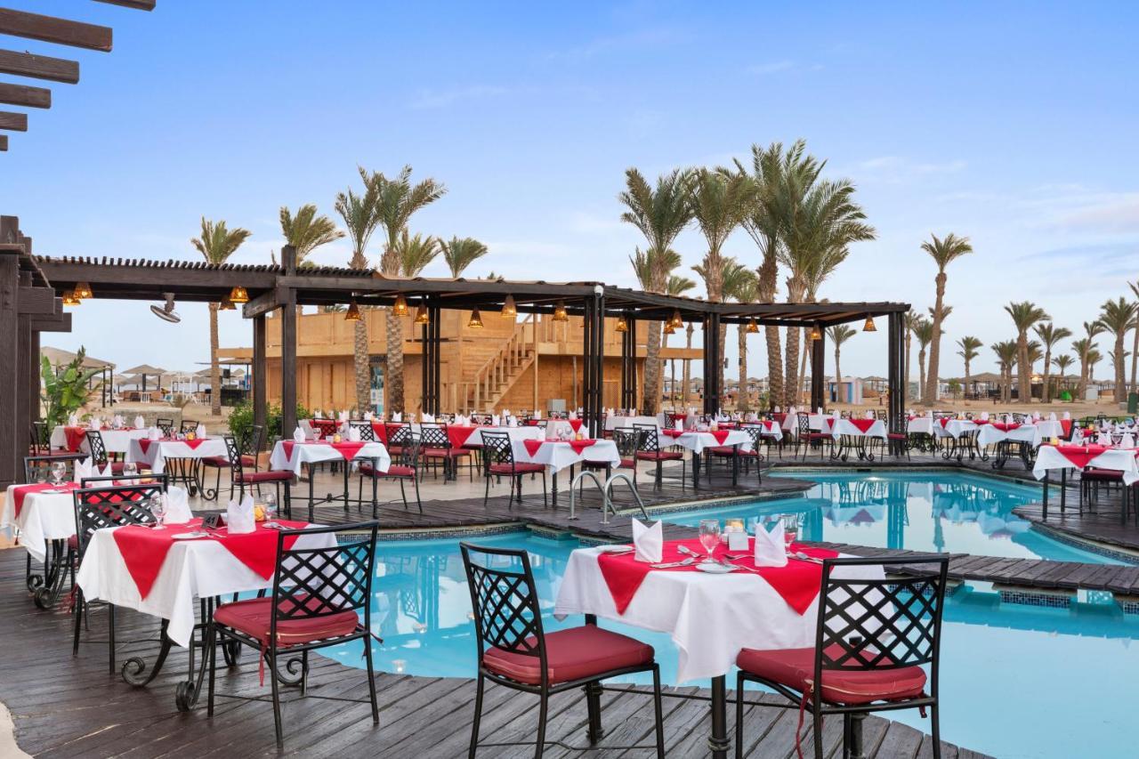 Pickalbatros Sands Port Ghalib Eksteriør billede The swimming pool at the Hilton Sharm El Sheikh